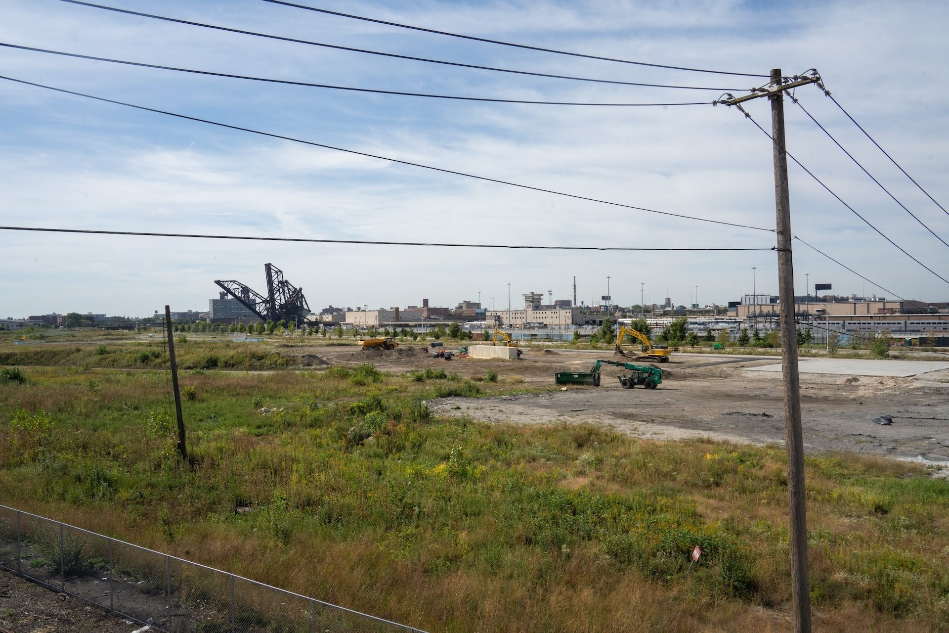 Power lines are seen crossing a large empty lot called The 78, a vacant tract of land in the South Loop that will house the new Chicago Fire stadium, with developers slated to break ground this week.
