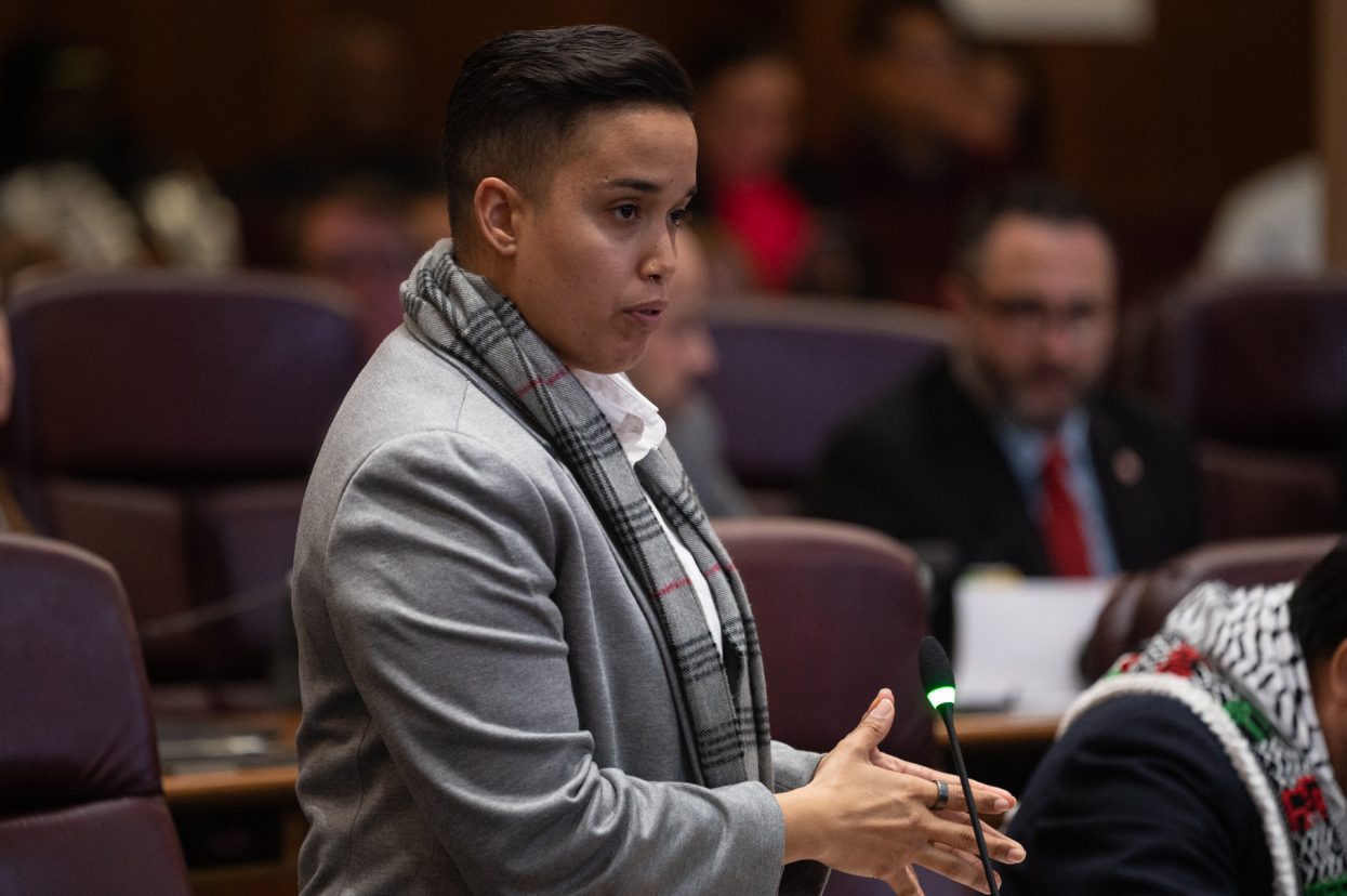 Ald. Jessie Fuentes (26th) stands up inside City Hall as she explains a new measure that states that the Civilian Office of Police Accountability (COPA) can investigate complaints against Chicago Police officers coordinating with federal immigration agents during a city council meeting on March 18, 2026.
