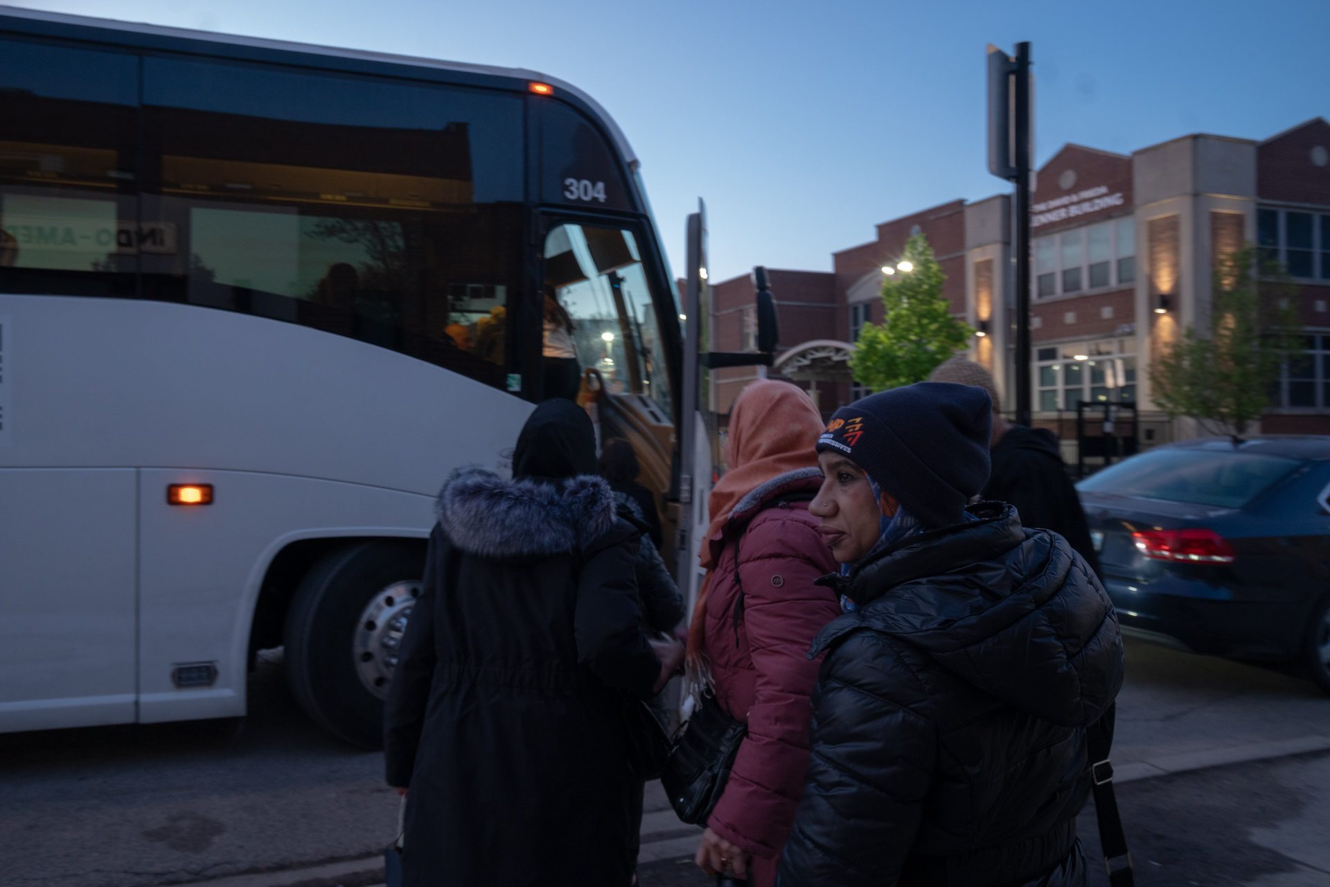 Aisha Sheikh, a member of the “I Speak Power” (ISP) leadership program, lines up to board the bus to Springfield right before sunrise during Asian American Action Day on May 6, 2026.