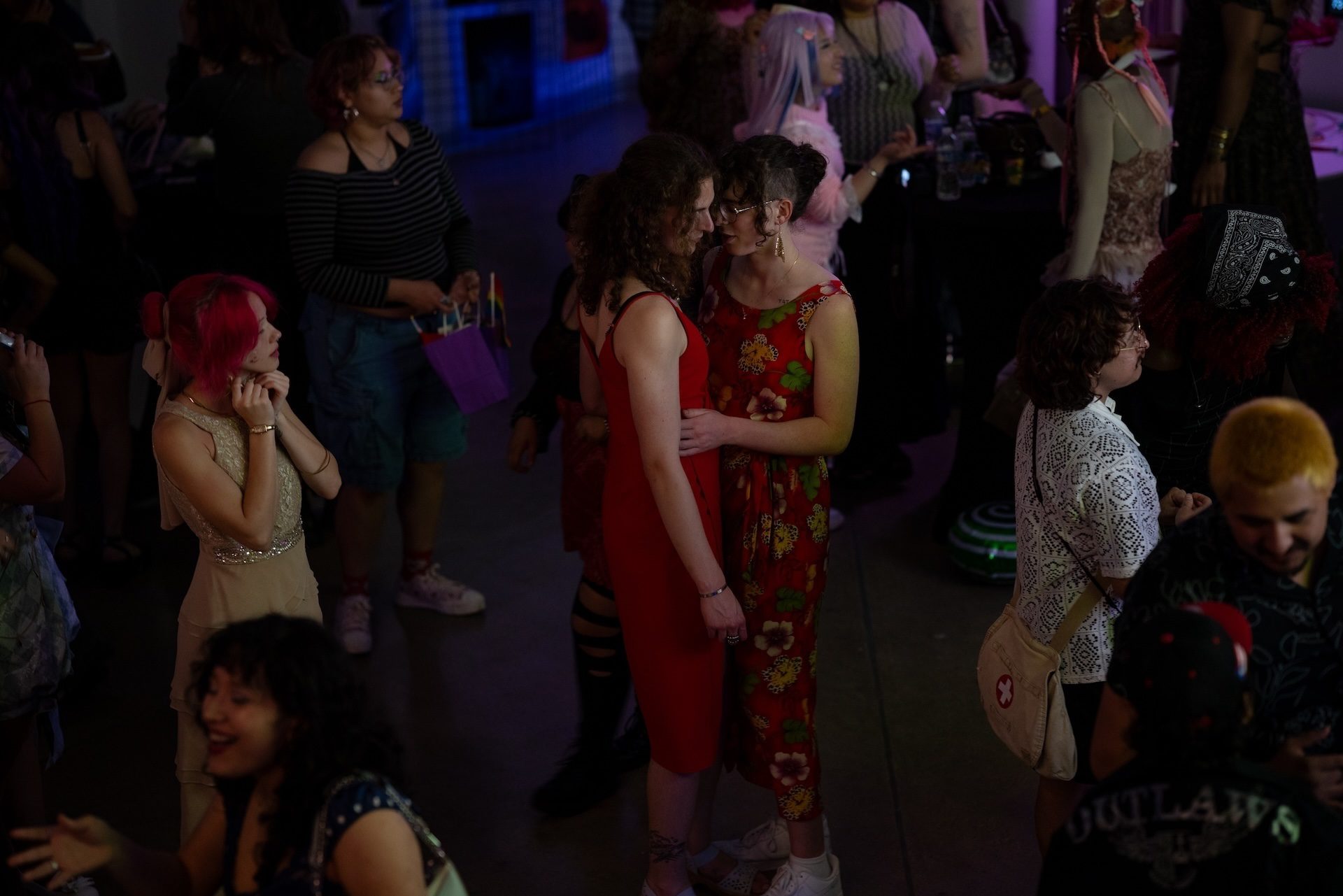 Two attendees embrace on the dance floor during Yoloccalli and CALOR’s queer prom on June 13, 2026.