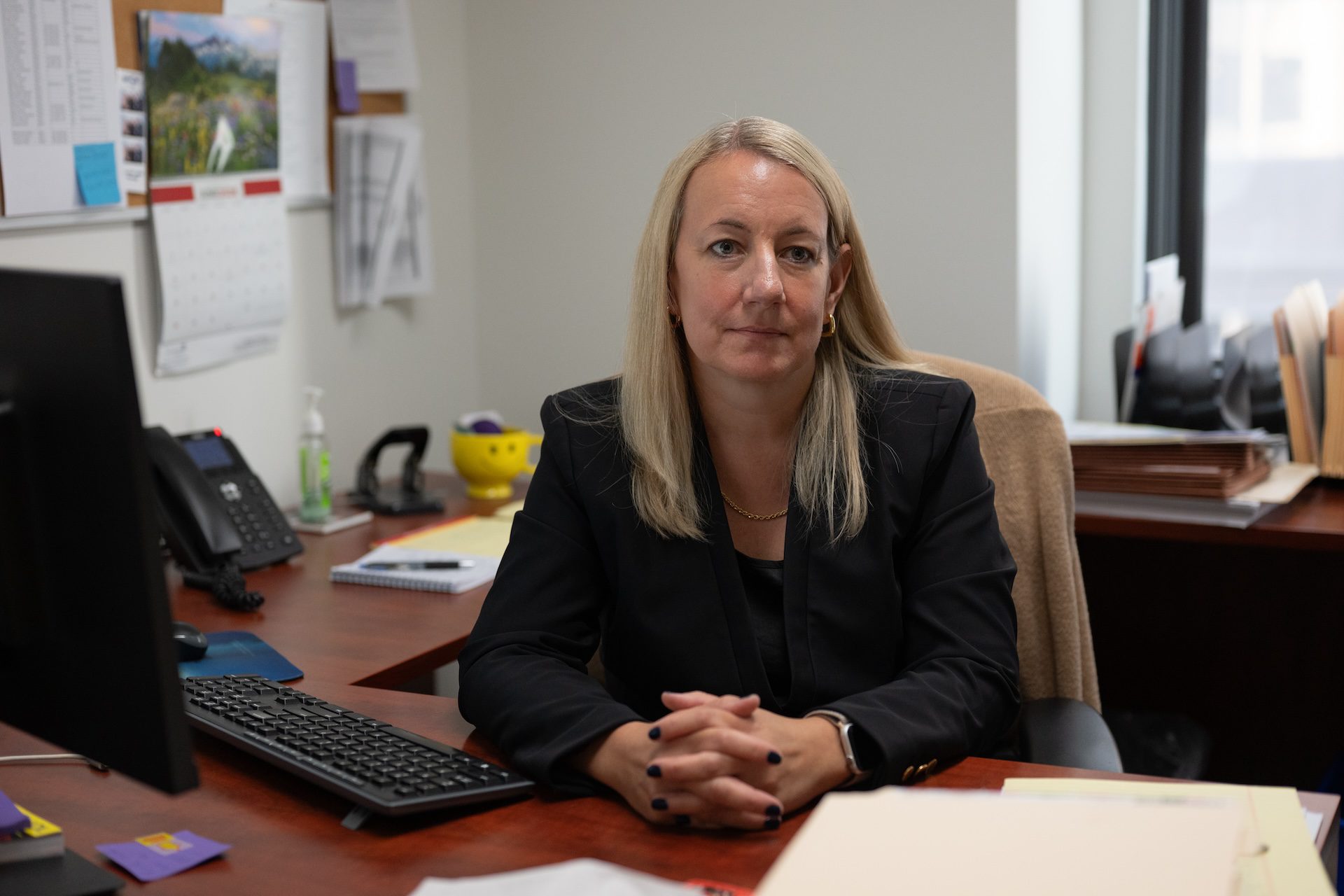 Immigration attorney Shannon Shepherd sits at her desk at her downtown office.