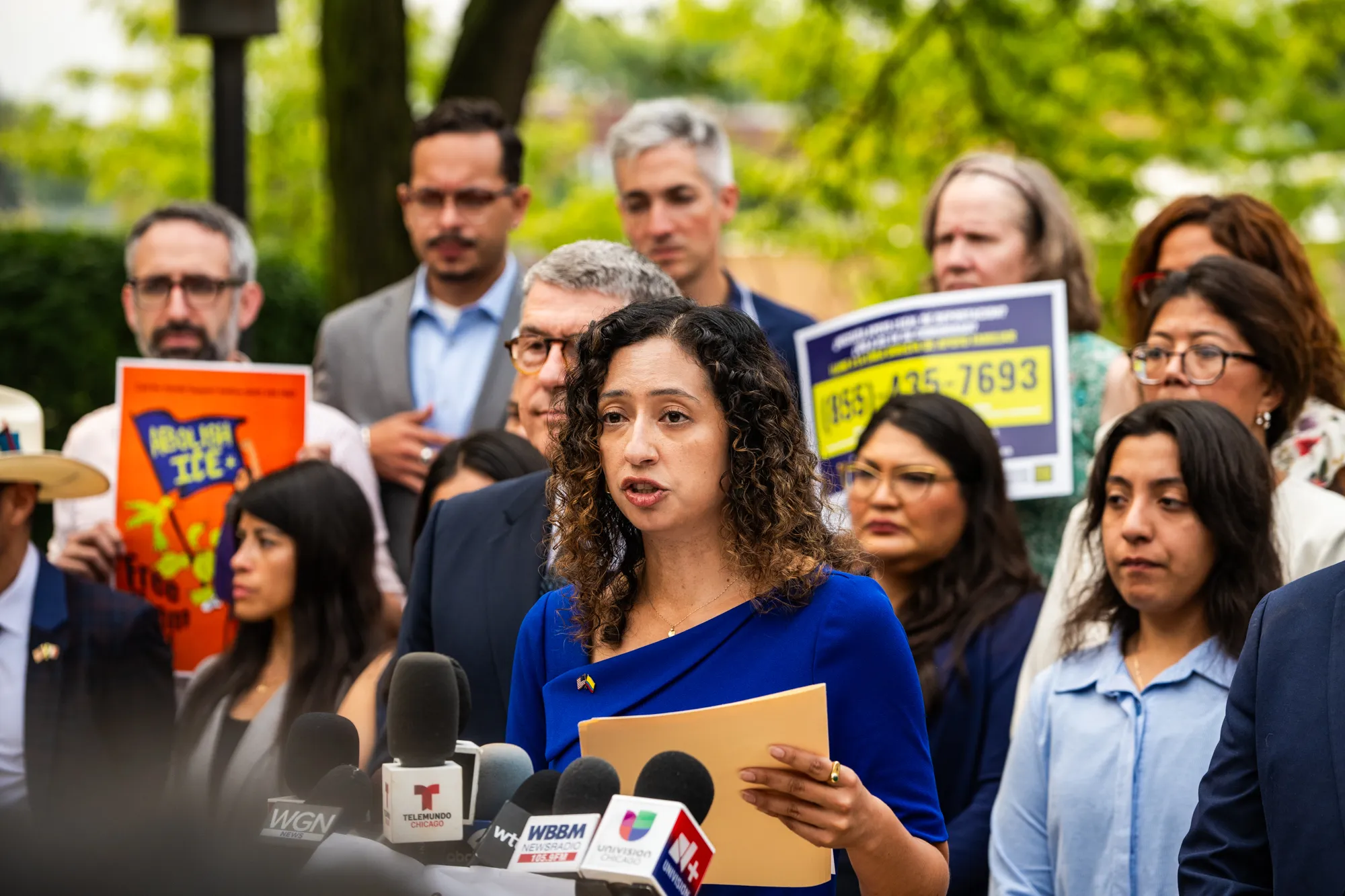 Commissioner Jessica Vásquez speaks as elected officials, attorneys, community leaders, and victims from Operation Midway Blitz hold a press conference on Aug. 10, 2026 outside the Chicago Police Department at 2452 W. Belmont Ave. in North Center ahead of filing police reports with the Chicago Police Department that allege crimes committed by ICE agents.