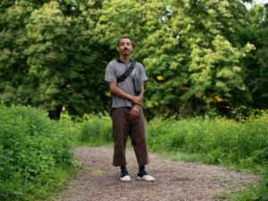 Alejandro Quiroz poses for a portrait on a path in McKinley Park’s natural reserve on May 30, 2026.