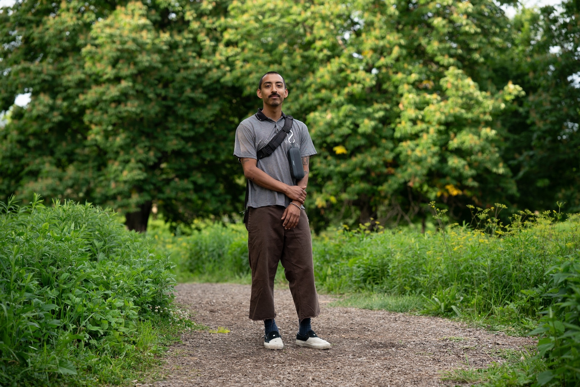 Alejandro Quiroz poses for a portrait on a path in McKinley Park’s natural reserve on May 30, 2026.