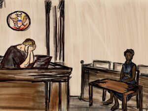 A middle-aged woman speaks to a judge who puts his hands on his head in frustration as there are no court room interpreters.